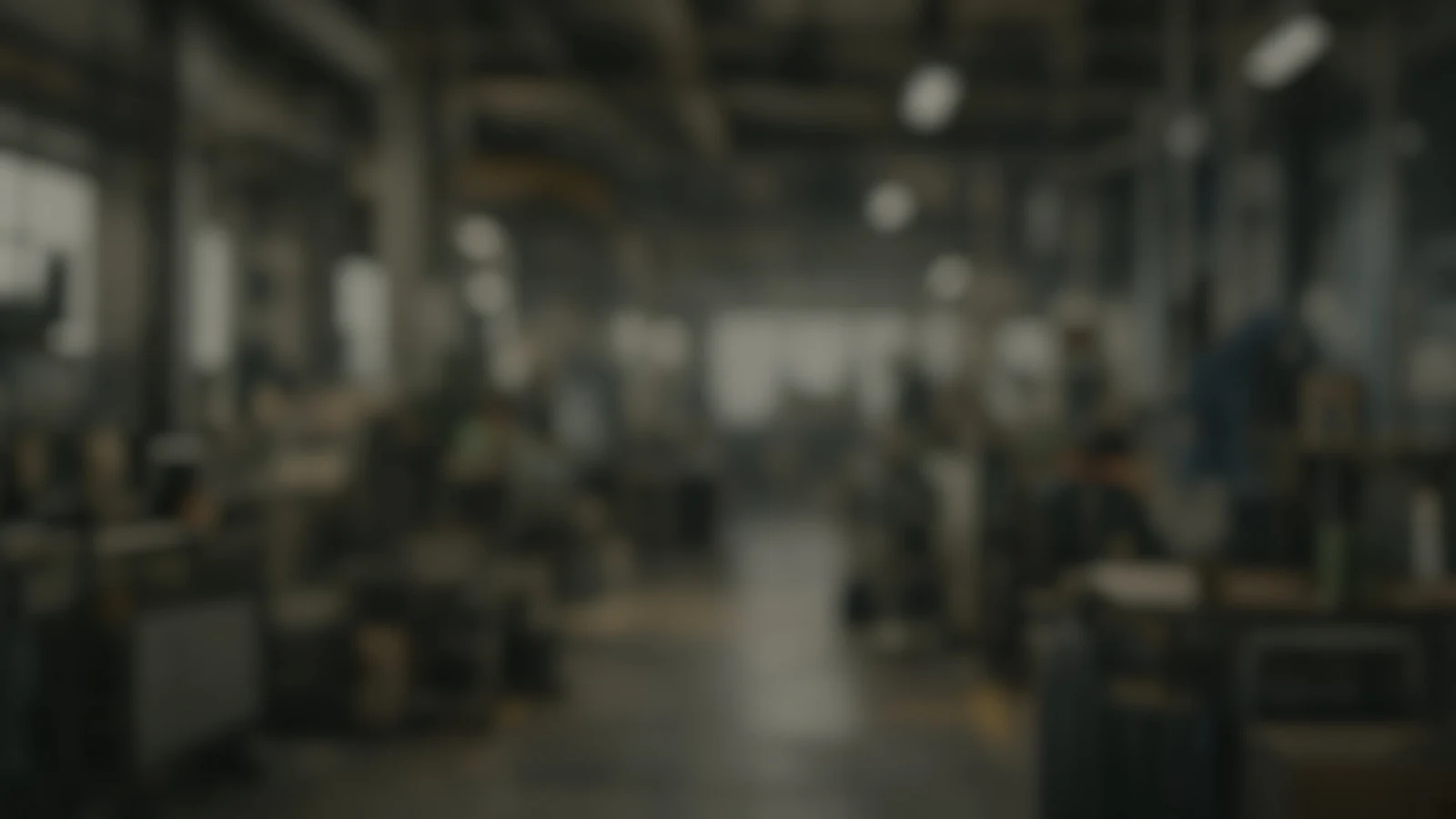 Calm dark blurred industrial office background suitable for a contact form